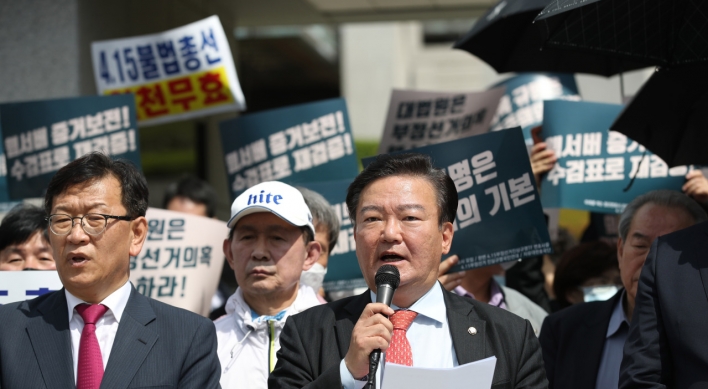 Defeated opposition lawmaker asks top court to nullify election results