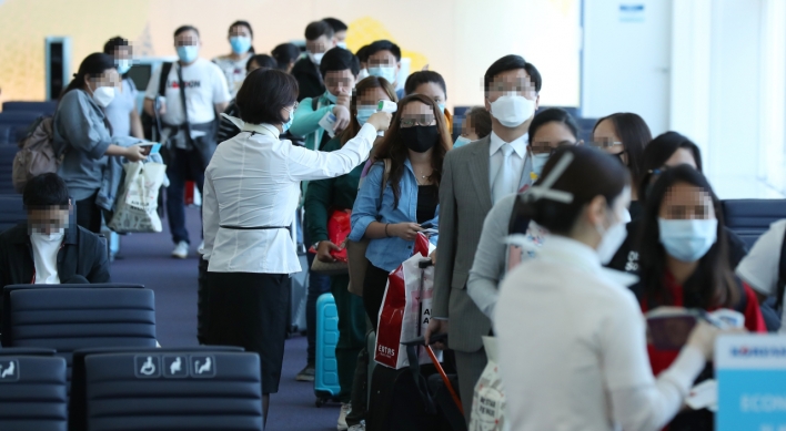 All air travelers required to wear masks from Wednesday