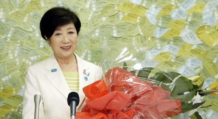 Tokyo governor wins 2nd term, buoyed by handling of virus