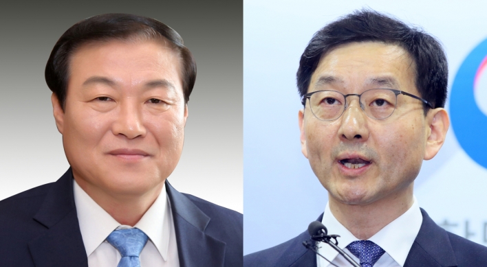 Moon replaces two more senior aides