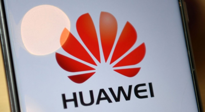China urges 'fair' treatment after France restricts Huawei
