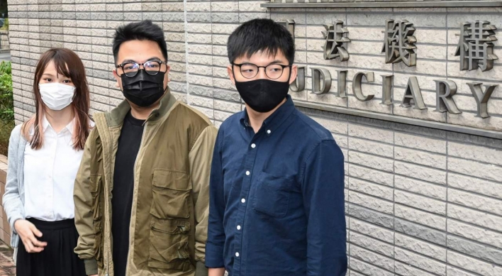 Hong Kong activists including Joshua Wong in custody after guilty protest plea