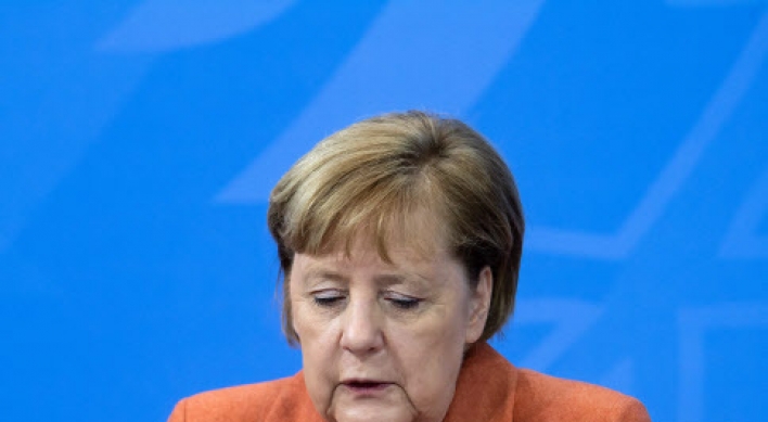 German virus deaths top 40,000 as Merkel warns of 'hardest weeks'