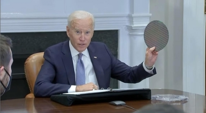 Biden pledges more investment in meeting over semiconductor shortage