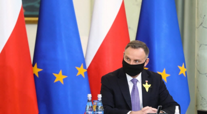 Poland plans to ease virus restrictions by end of May