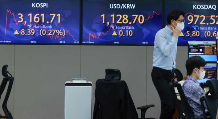 Seoul shares open higher on eased inflation worries