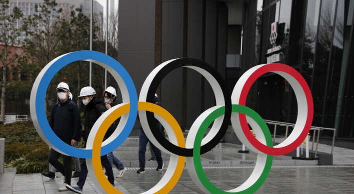 Tokyo elects assembly amid pandemic fears over Olympics
