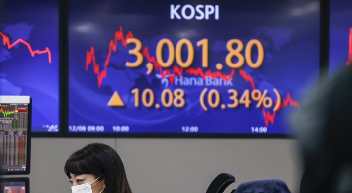 Seoul shares open lower on ex-dividend date