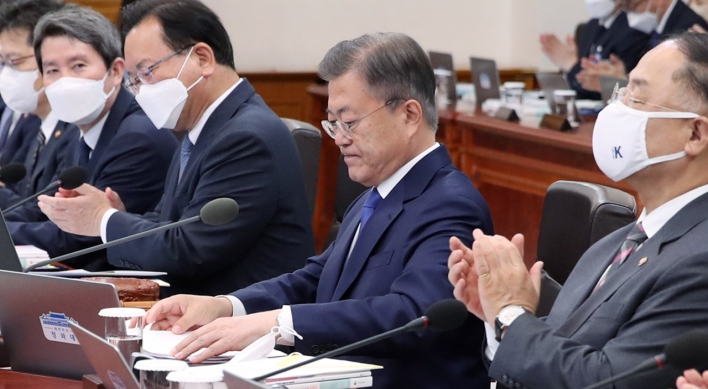 Moon Jae-in signs controversial prosecution bills into law