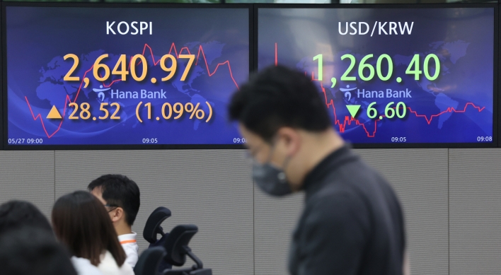 Seoul shares open higher on Wall Street gains