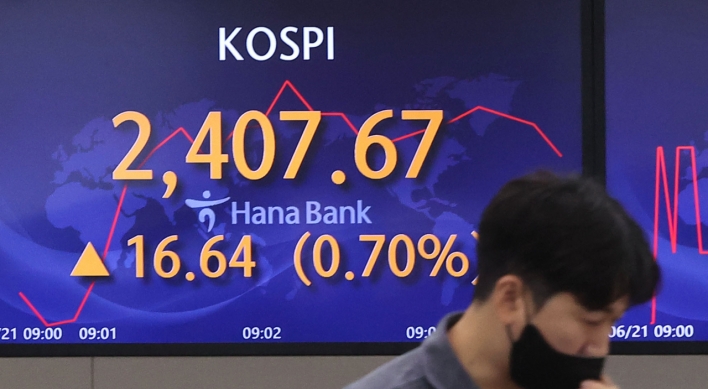 Seoul shares open slightly higher after Monday's rout