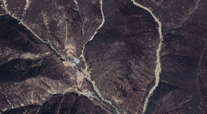 After heavy rains, N. Korea stops reenabling tunnel at nuclear test site: satellite imagery