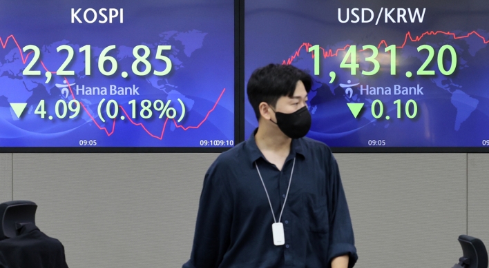 Seoul shares open tad higher after Monday's plunge
