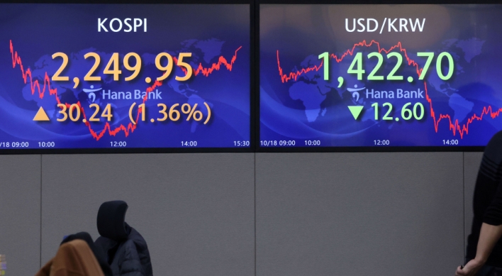 Seoul shares open higher on Fed hopes