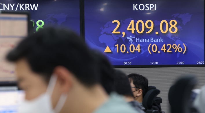 Seoul shares open tad higher ahead of US midterm election results