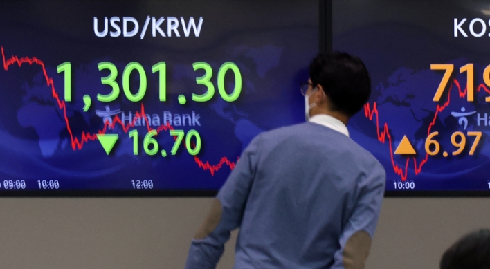 Seoul shares end higher ahead of key US inflation data