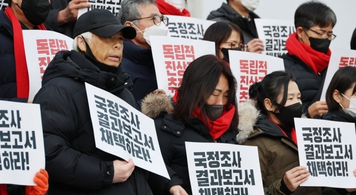 Bereaved father collapses as Itaewon disaster probe ends in partisan row