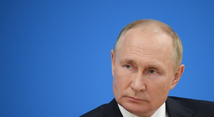 International court issues war crimes warrant for Putin