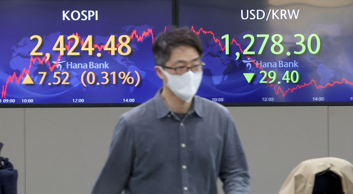 Seoul shares open lower amid rate concerns