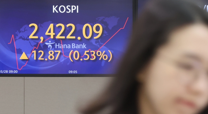 Seoul shares open higher on easing banking crisis