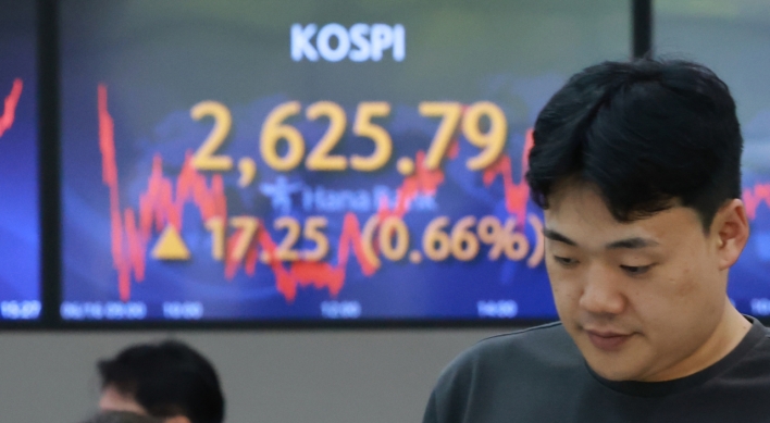 Seoul shares open lower on Fed's hawkish rate outlook