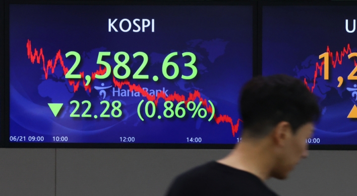 Seoul shares open almost flat as Powell signals more rate hikes
