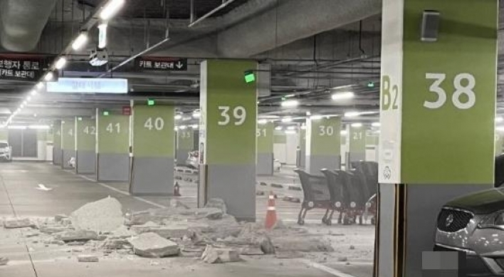 Supermarket parking lot roof partially collapses in Songdo