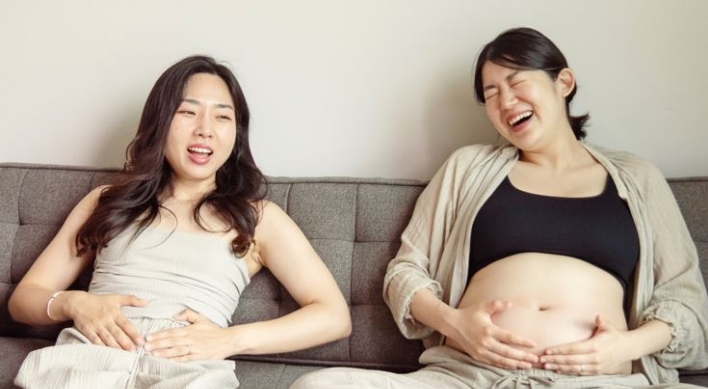 First lesbian to become a mother in S. Korea on struggle to be a 'normal' parent