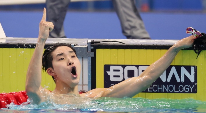 Swimmer Kim Woo-min captures 3rd gold in Hangzhou