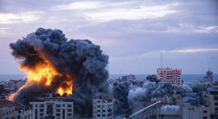 Hamas surprise attack out of Gaza leaves hundreds dead in fighting, retaliation