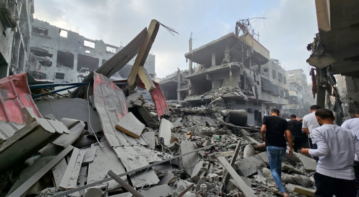 Israel strikes across Gaza after allowing aid convoy into besieged enclave
