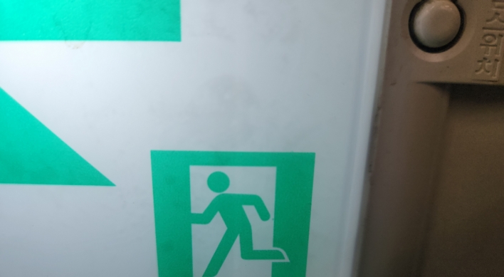 Netizens abuzz over false rumors of 'politically correct' skirt-wearing fire exit signs
