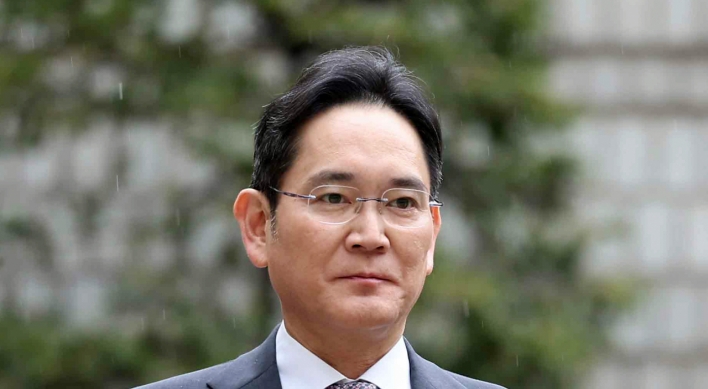 Samsung chief's return to board pushed back as trial continues