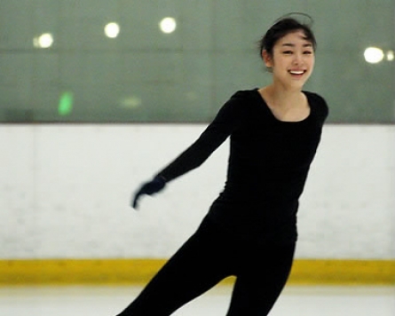 Kim Yu-na looks forward to world championships