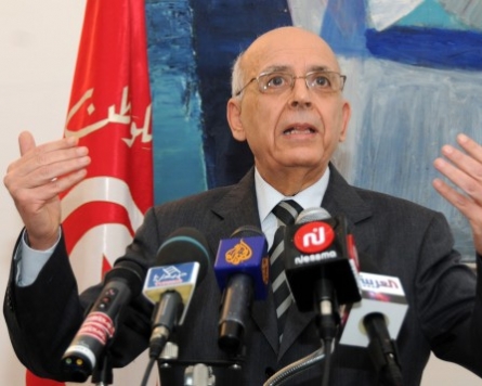 Tunisia gets new premier after new violence