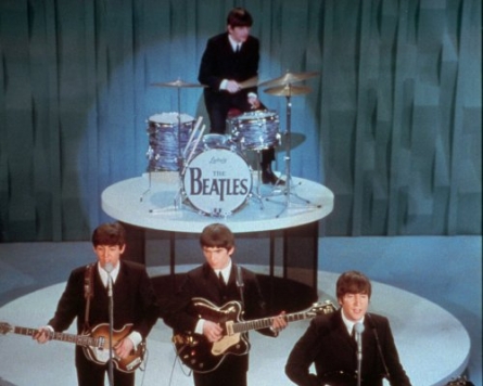 Website to pay $950,000 after selling Beatles hits