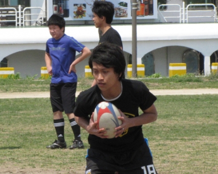 Rugby clinic puts Malaysian students in touch