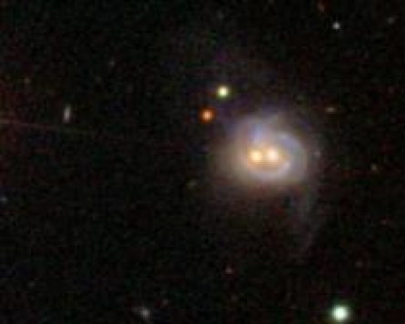 Monster black hole twins found in galaxy center