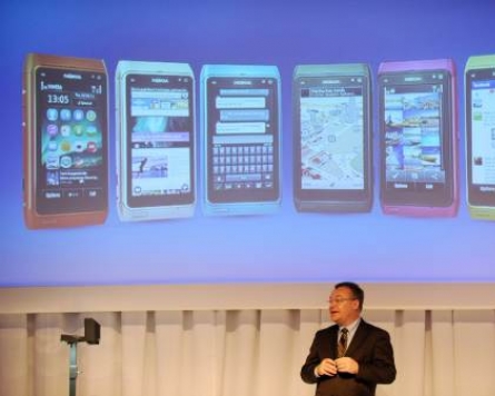 Nokia unveils mobile  phones in Asia to stem Google, Apple advance