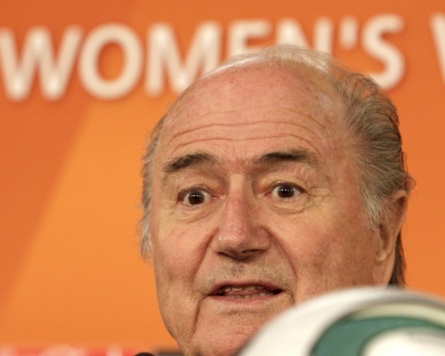 Blatter talks WC soccer, not bribery allegations