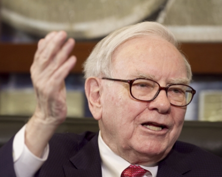Berkshire buys 5 percent of IBM, takes other stakes