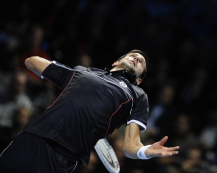 Ferrer stuns tired Djokovic at ATP Finals
