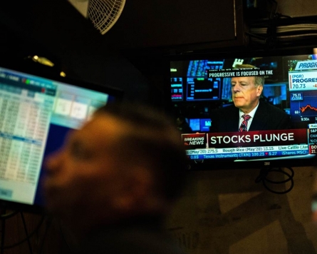Global stocks suffer historic rout, shrugging of central bank steps