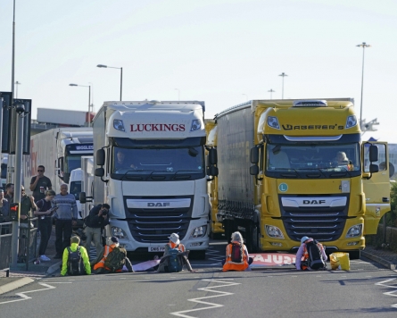 UK climate activists block entrance to Dover ferry port
