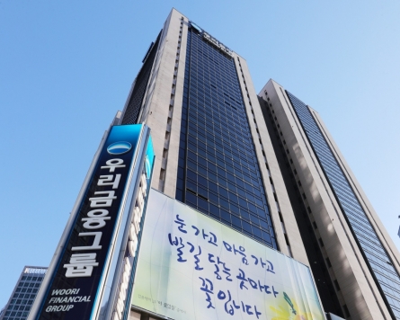 [Newsmaker] Woori Financial Group fully privatized after 23 years: FSC