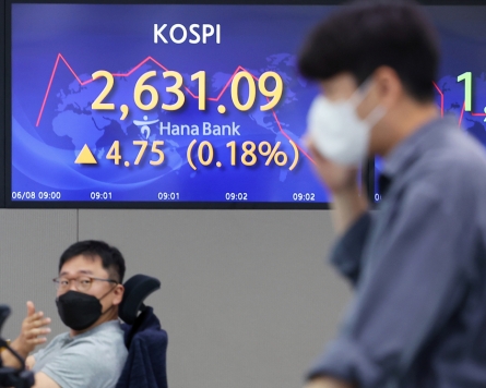 Seoul shares open lower ahead of US inflation data