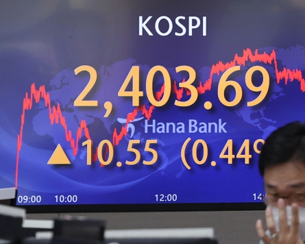 Seoul shares open lower ahead of US rate decision
