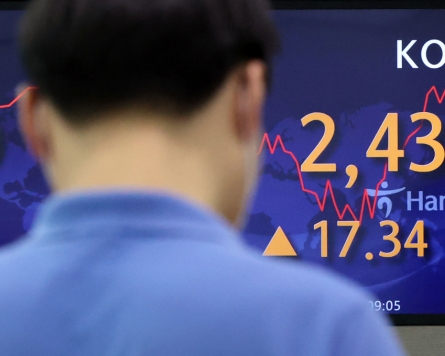 Seoul shares open higher on eased uncertainty over Fed's rate hikes