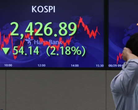 Seoul stocks open slightly higher amid earnings woes