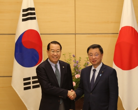 Unification minister meets top Japanese officials in Toky